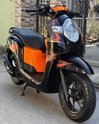 n Scoopy màu nâu chạy hơi bị êm mấy rin tại Quảng Nam